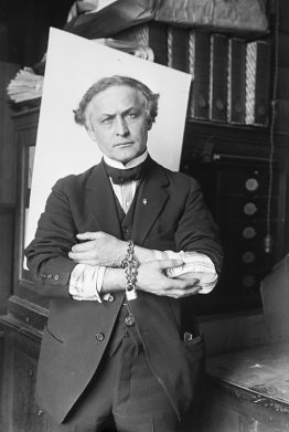 Houdini Showing How To Escape Handcuffs